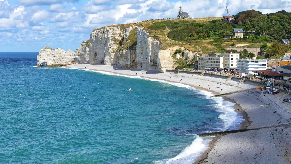 White chalk cliffs and arch at Étretat on a private day trip from Paris to Rouen, Étretat and Honfleur, France