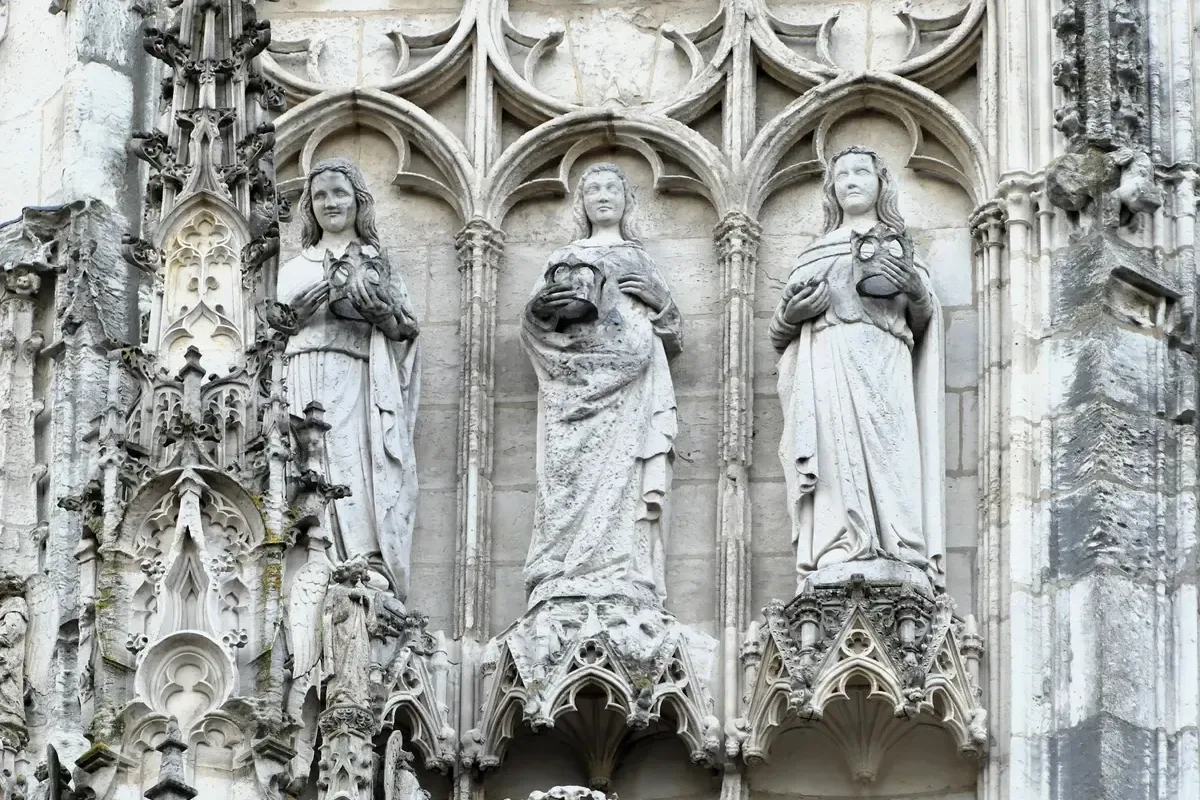 Carved saints on the west front of Rouen Cathedral on a day trip from Paris by train