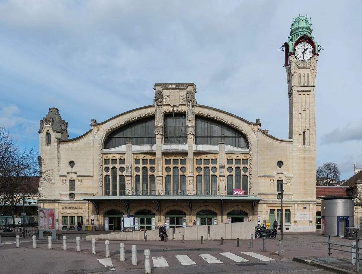 Clock tower and facade of Rouen-Rive-Droite station on a train day trip from Paris to Normandy