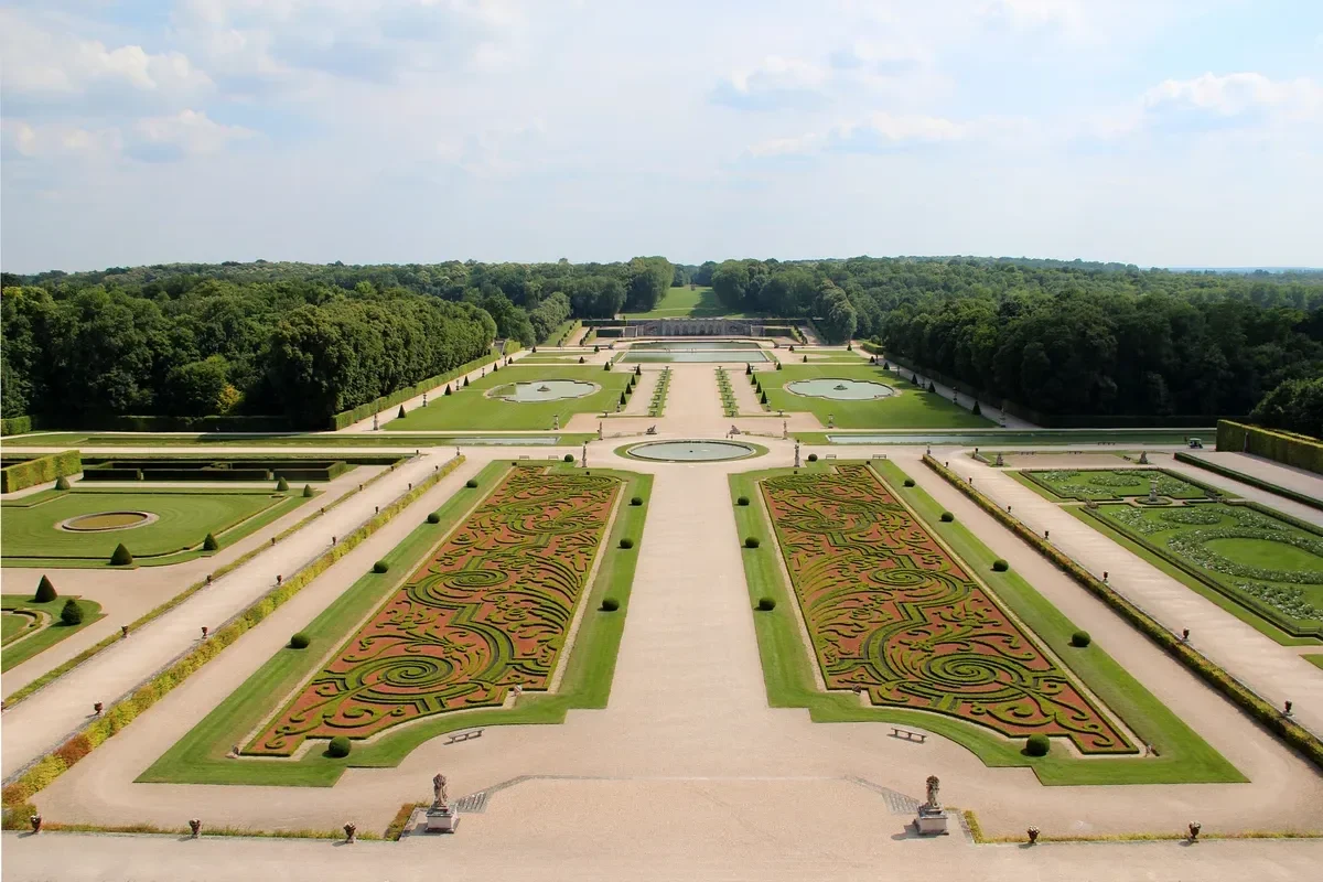 Formal parterres of the gardens at Vaux-le-Vicomte on a Fontainebleau and Vaux-le-Vicomte day trip from Paris