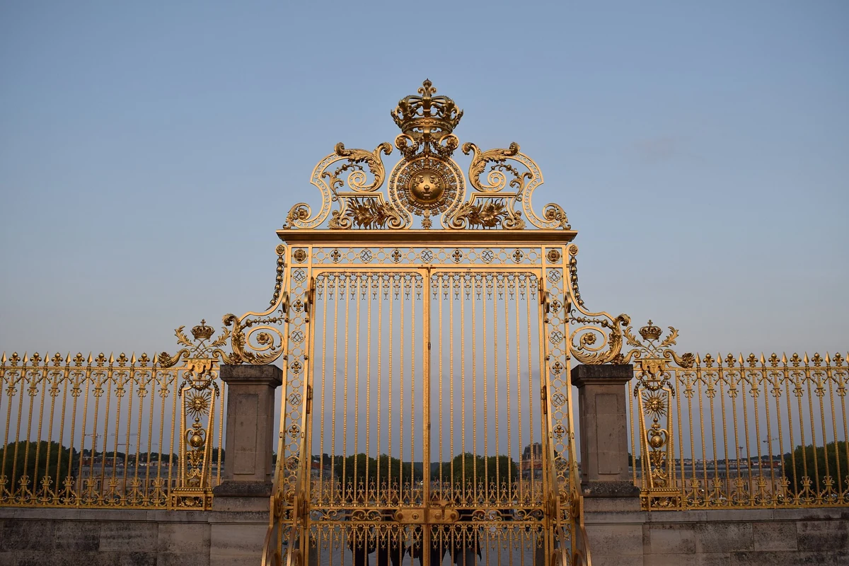 Gilded Royal Gate of the Palace of Versailles, a day trip from Paris by train