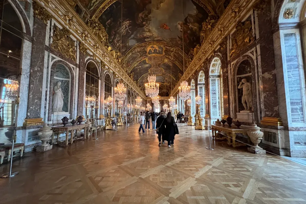 The Hall of Mirrors in the Palace of Versailles on a free day trip from Paris by RER C